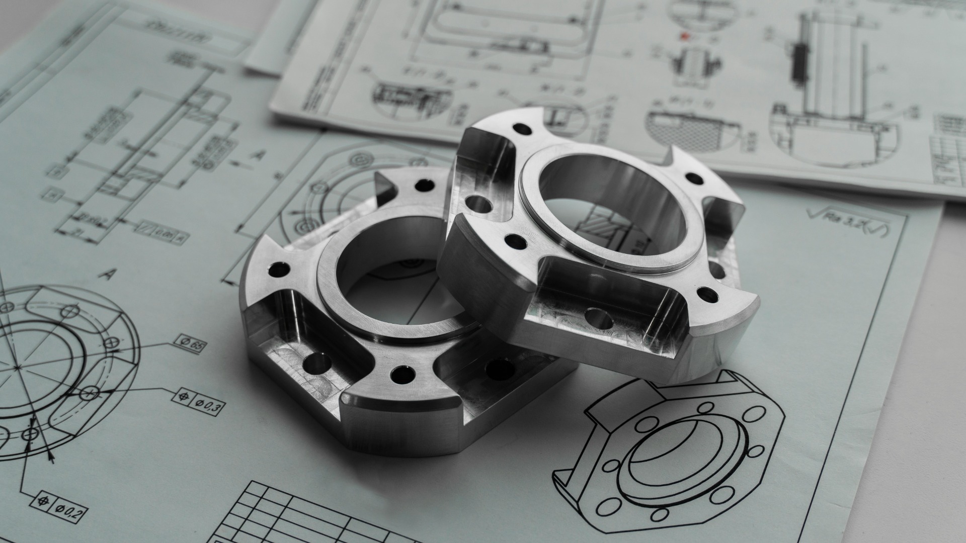 Precision machined metal components evaluated through Life Cycle Assessment (LCA) and environmental impact analysis.